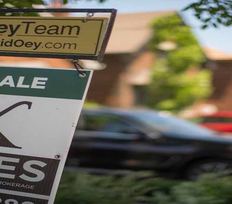 Home prices climb in a less-fevered June market